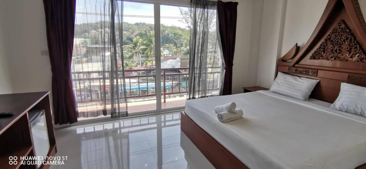 Sure Guesthouse Kamala Beach Esterno foto